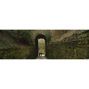 Couple Standing under an Arcade, Luxembourg City, Luxembourg by 