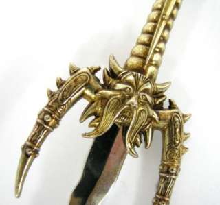 OLD LETTER OPENER KNIFE SWORD WAVY BLADE SKULL HANDLE WITH STAND 