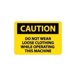 OSHA CAUTION Do Not Wear Loose Clothing While Operating This Machine 