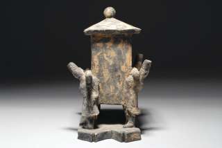   forwards and carrying a throne, dating to approximately 1300 A.D