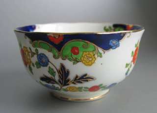 hand painted open sugar bowl with all its bright colors. Priced to 