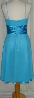   pleated satin waist line with satin bow on the wait line spaghetti