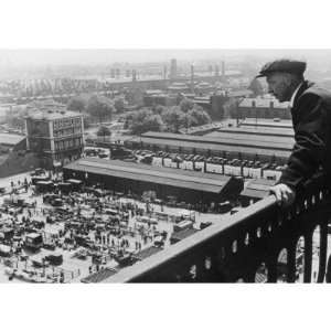  A Man Looks Down over the Old Caledonian Road Market 