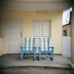  Blue and White Chairs Against a Yellow Wall, Vinales, Cuba 