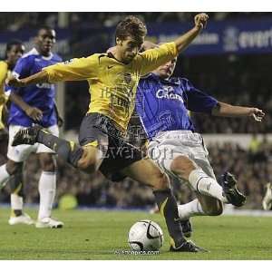  Evertons Carsley challenges Arsenals Flamini for the ball 