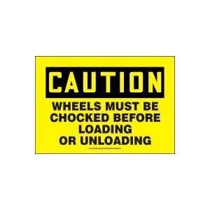  CAUTION WHEELS MUST BE CHOCKED BEFORE LOADING OR UNLOADING 