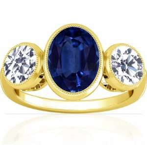  14K Yellow Gold Oval Cut Blue Sapphire Three Stone Ring 
