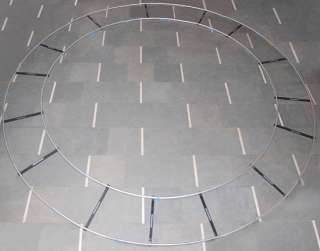   360 degree full circle the track is made of aluminium and is silver