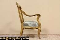   hand carving distinguishes this 1895 era armchair from Sweden