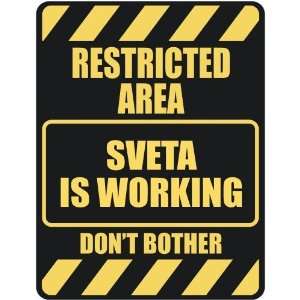   RESTRICTED AREA SVETA IS WORKING  PARKING SIGN