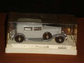 SOLIDO DIECAST TOY CAR RENAULT IN DISPLAY CASE  