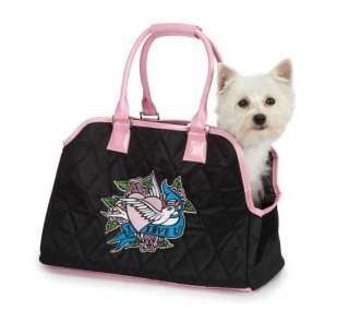 Our trendsetting quilted pet carrier features an I Love U insignia 