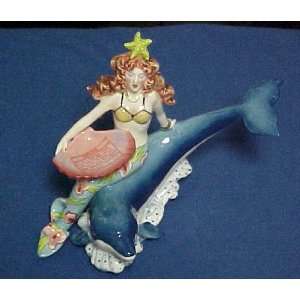 Mermaid riding a dolphin t lite 9 1/2 by 7  Sports 