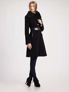   review sleek fitted silhouette tailored in rich wool and trimmed