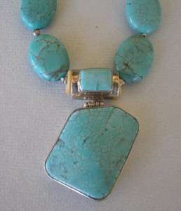 Turquoise sterling silver pendant on turquoise and silver beaded 