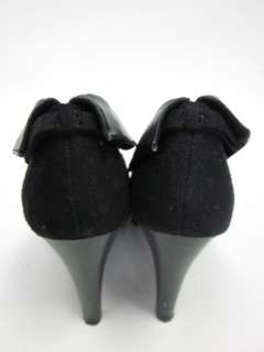 You are bidding on a pair of METRO 7 Black Ankle Booties Pumps Heels 