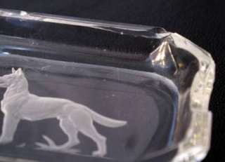   old intaglio glass ashtrays with a German Shepherd Dog as the subject