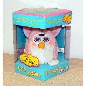    PINK AND WHITE W/ YELLOW MOHAWK PEACH FURBY BABY 1999 Toys & Games