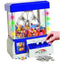 As Seen on TV The Claw Electronic Candy Machine Arcade Game w/Music 
