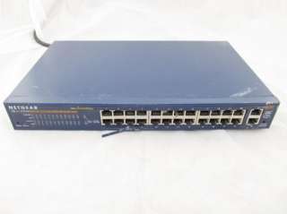   used Netgear FS526T 26 Port Smart Ethernet Switch Powered On Untested