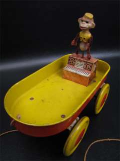 Rare Tin Pull Toy Musical Monkey Organ Grinder Wagon  